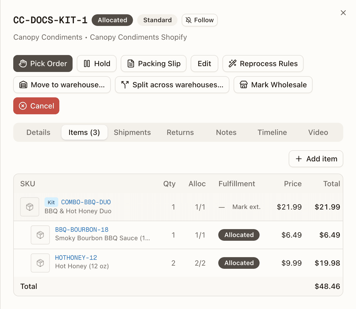 The Items tab on the kit order — the kit parent with its components indented, Alloc counts, line statuses, and the operator's Mark ext. button
