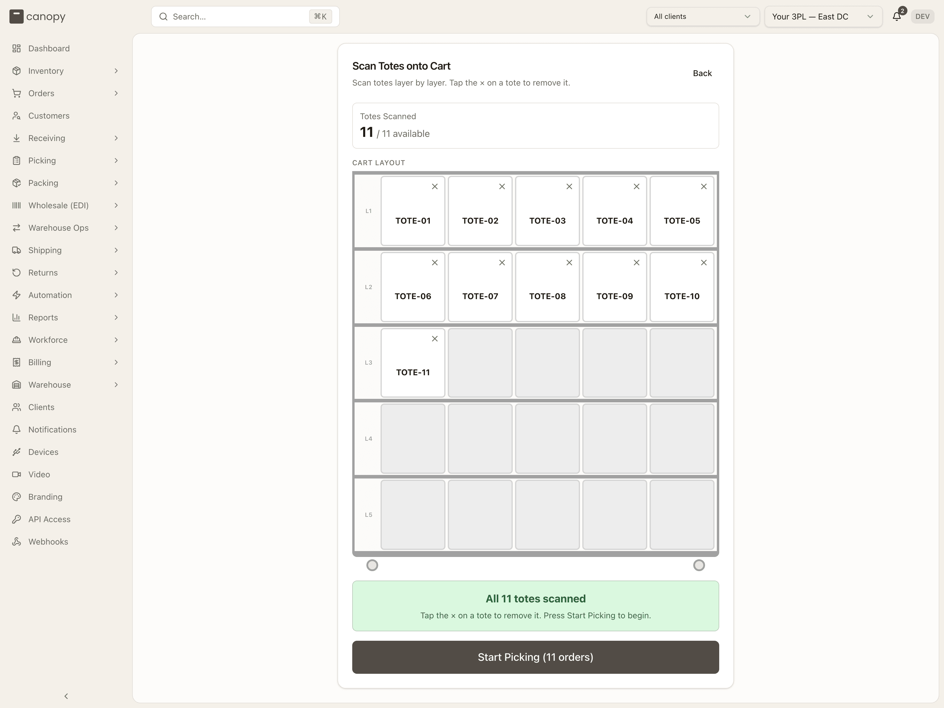 Scan Totes — a full cart with every order's tote scanned, ready to start picking